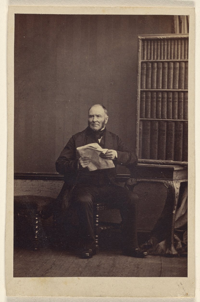[Homme non identifié assis, tenant un journal] - Camille Silvy