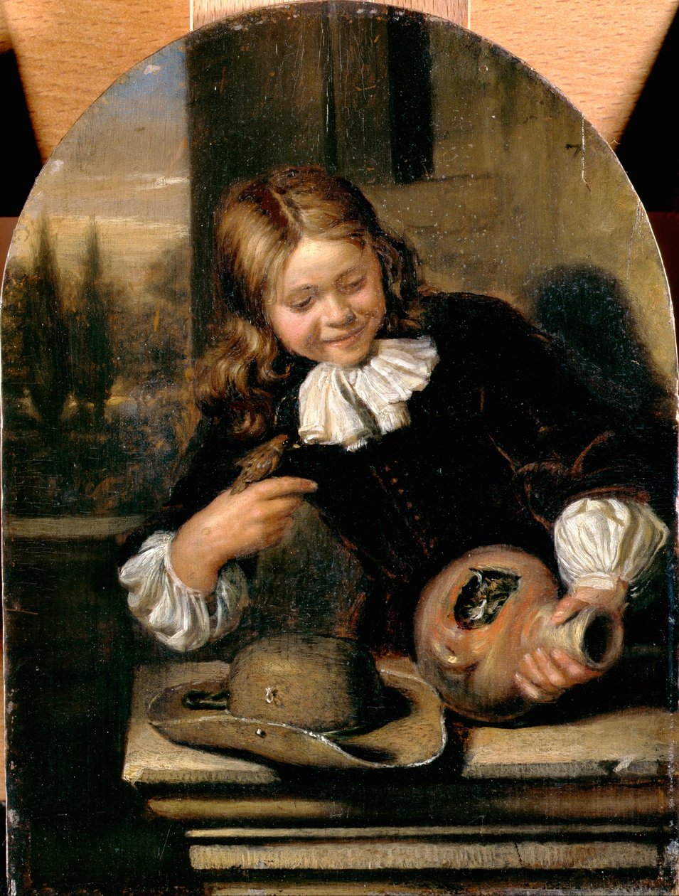Garçon avec une cruche et un nid d
