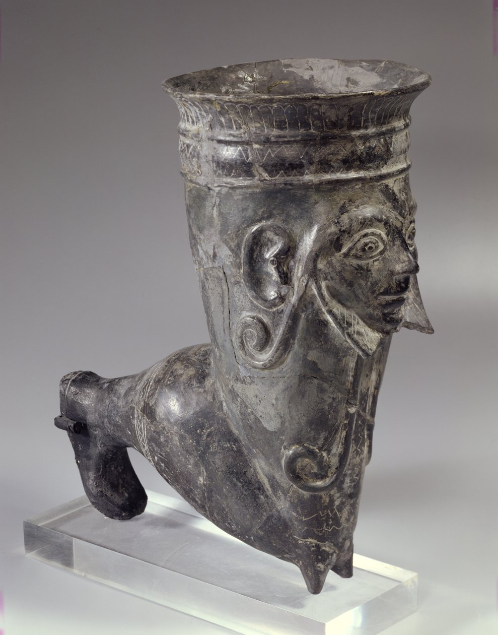 Vase en bucchero en forme de jambe avec visage sculpté, période étrusque, 2e moitié du 6e siècle av. J.-C. - Etruscan
