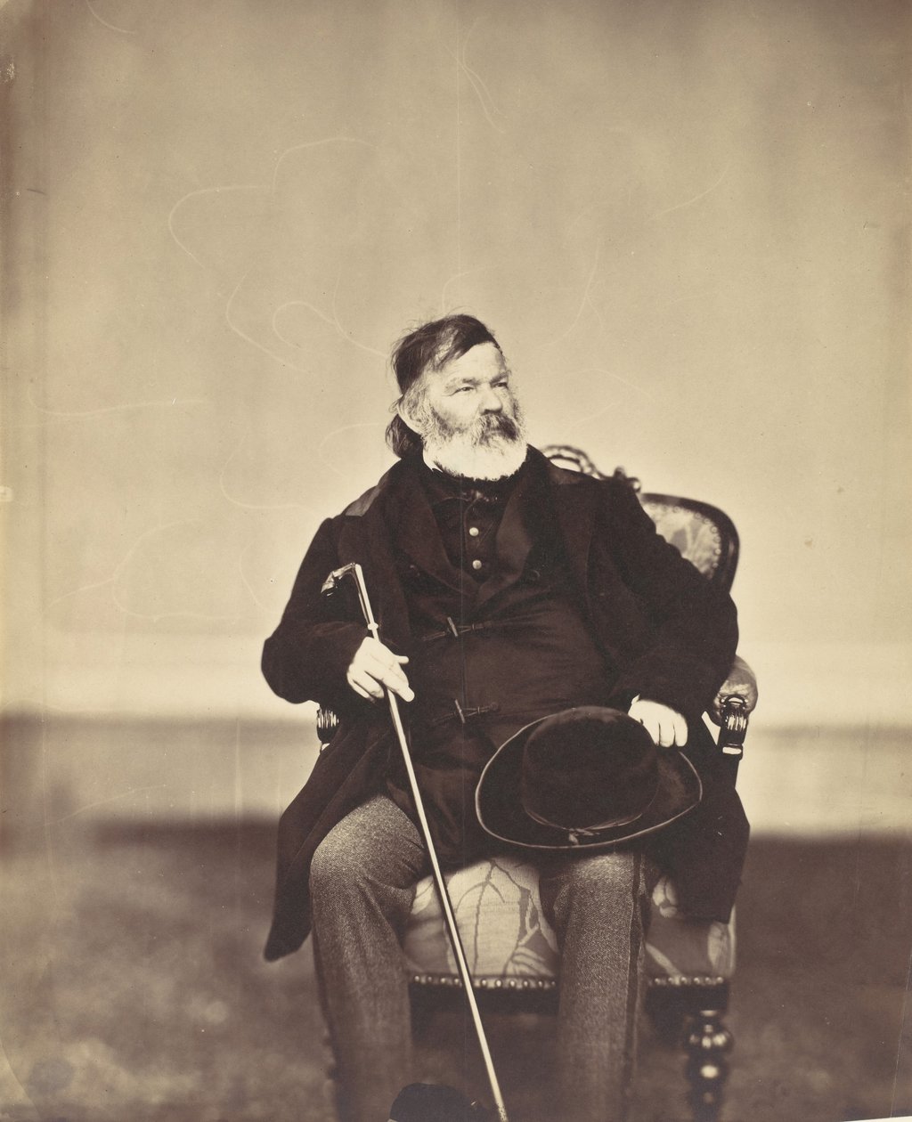 Homme assis avec une canne et un chapeau - Franz Antoine
