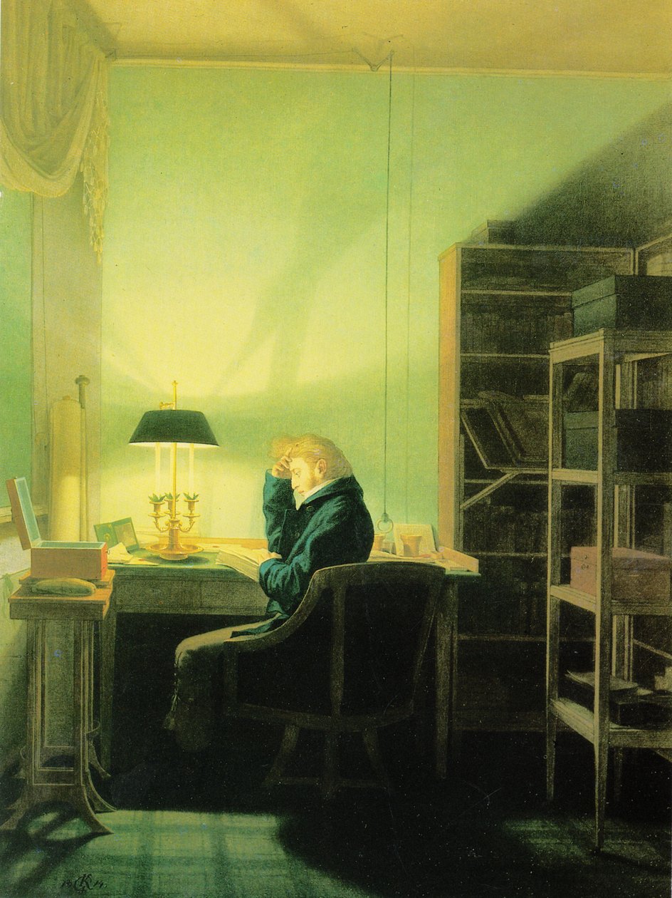 Homme lisant à la lumière d