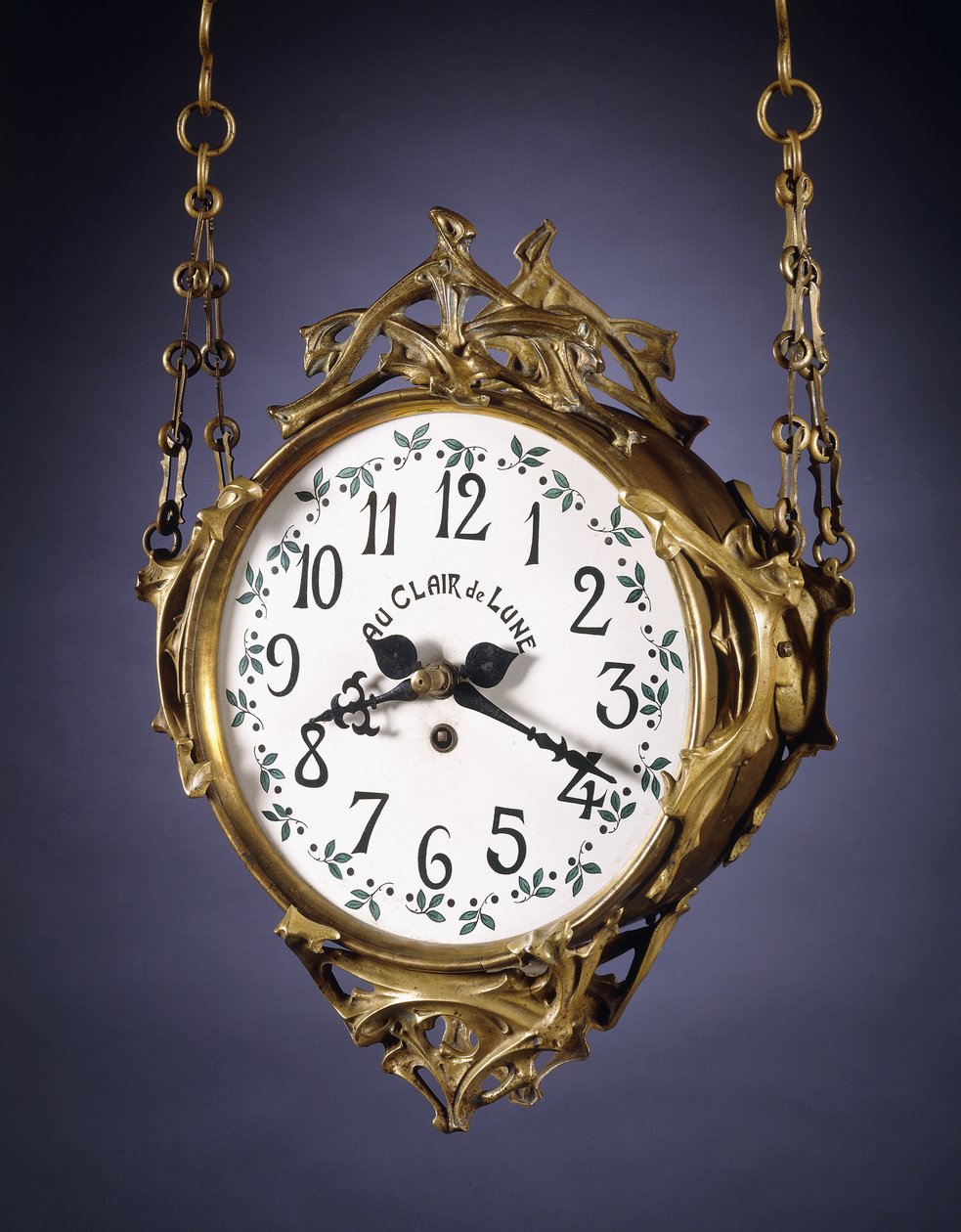 Une horloge suspendue à double cadran - Hector Guimard