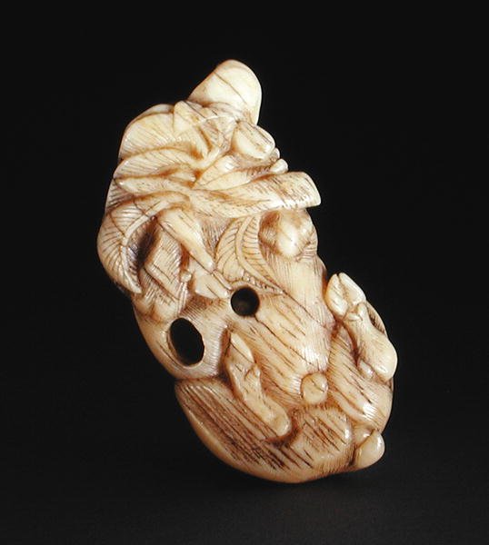 Netsuke représentant un sanglier allongé, vers 1750-80 - Japanese School