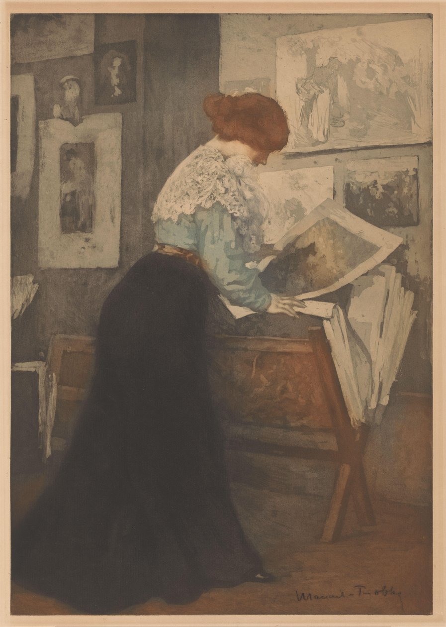 Femme devant un présentoir à gravures - Manuel Robbe