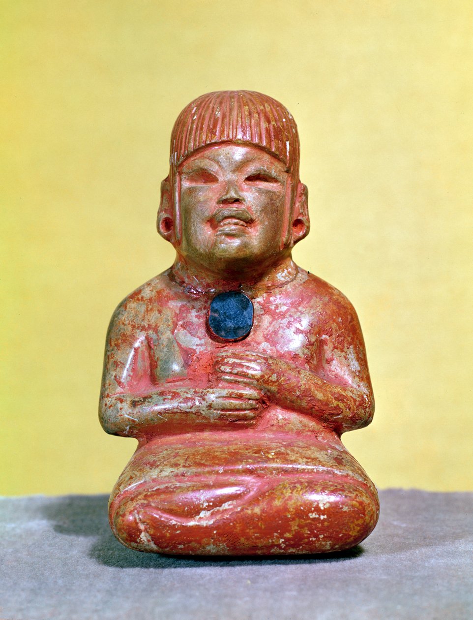 Figure assise, peut-être l