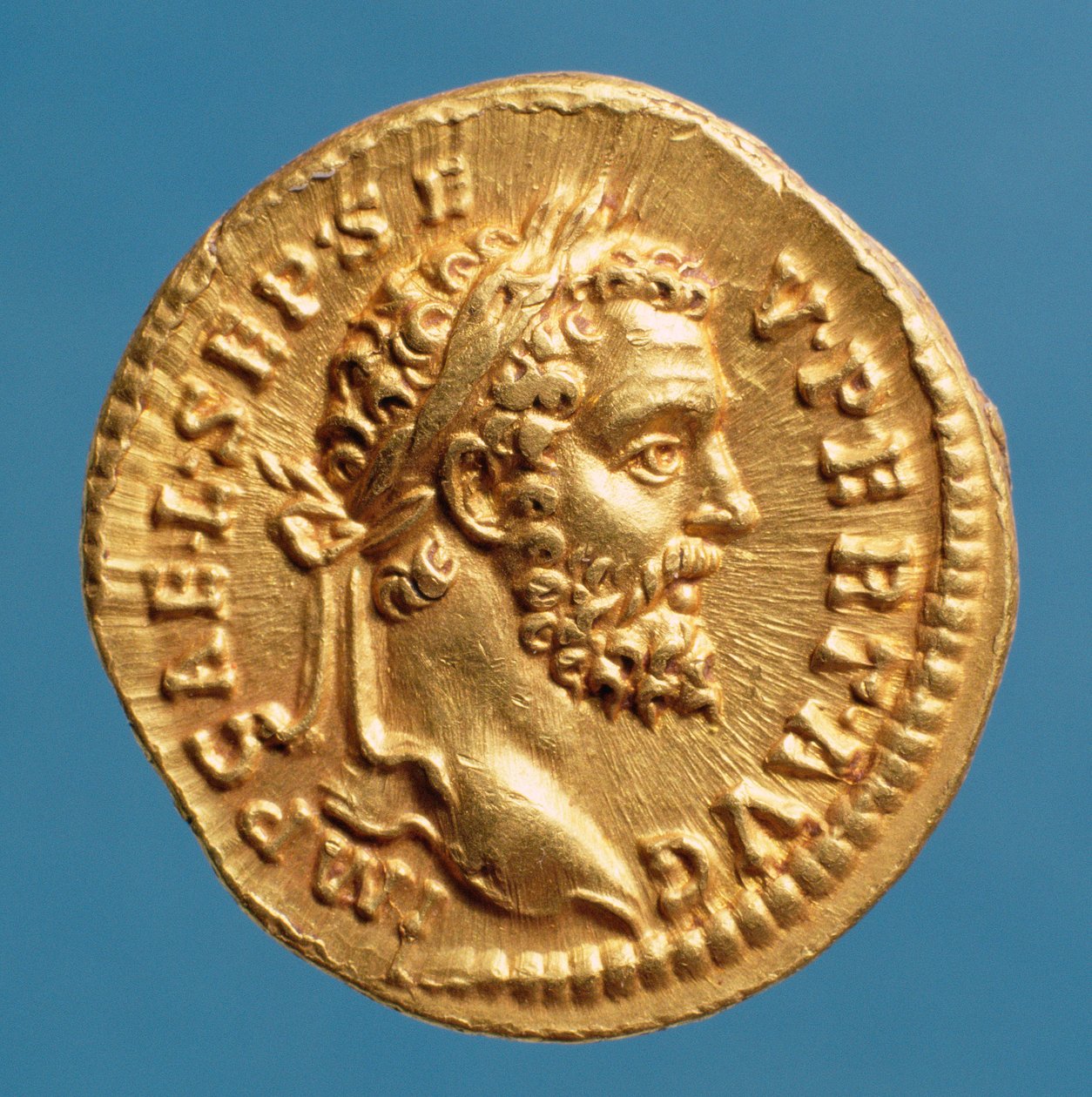Aureus (avers) de Septime Sévère (193-211) portant une couronne de laurier. Inscription : IMP CAE L SEP SEV PERT AVG - Roman