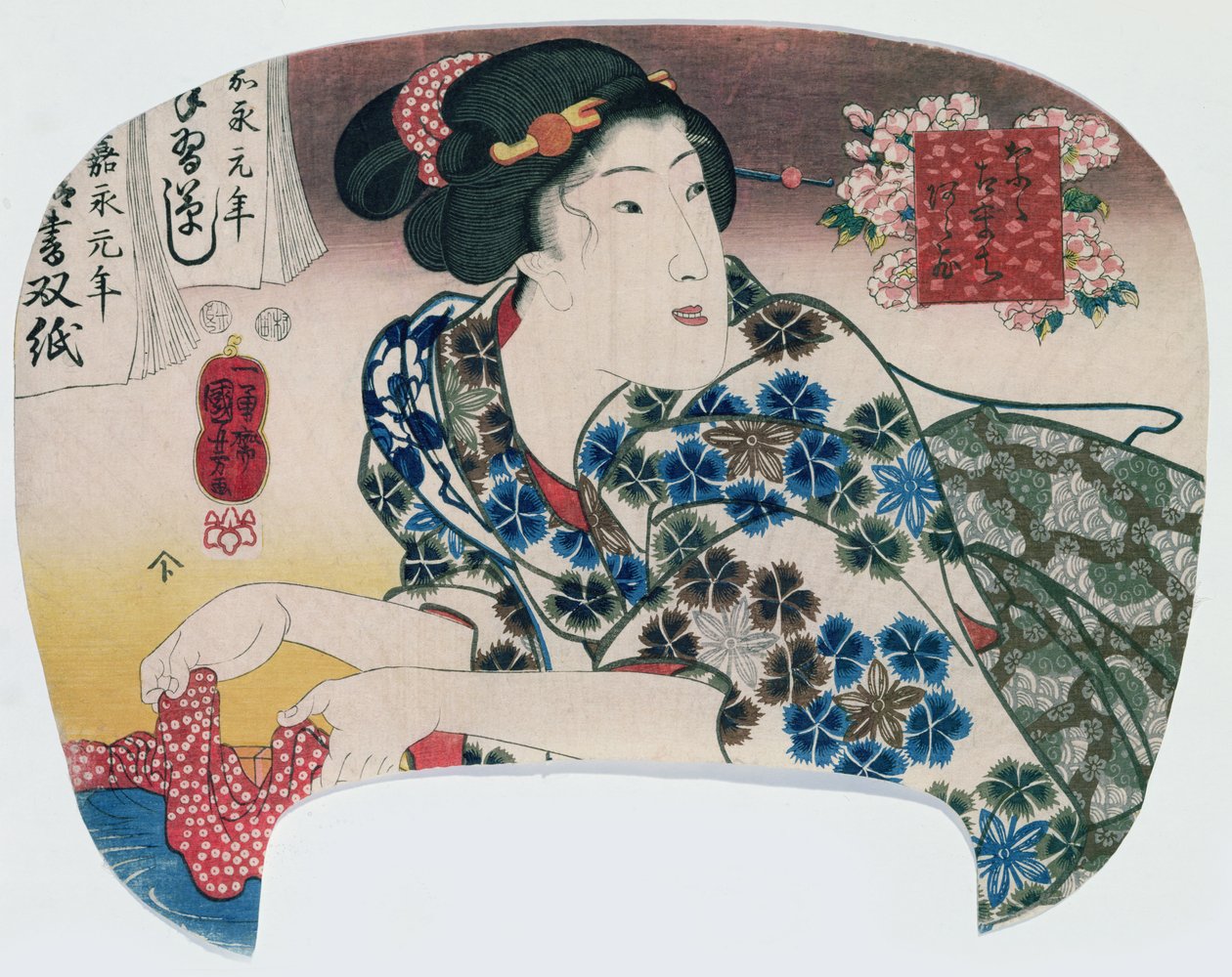Fille lavant un tissu à motifs, de 