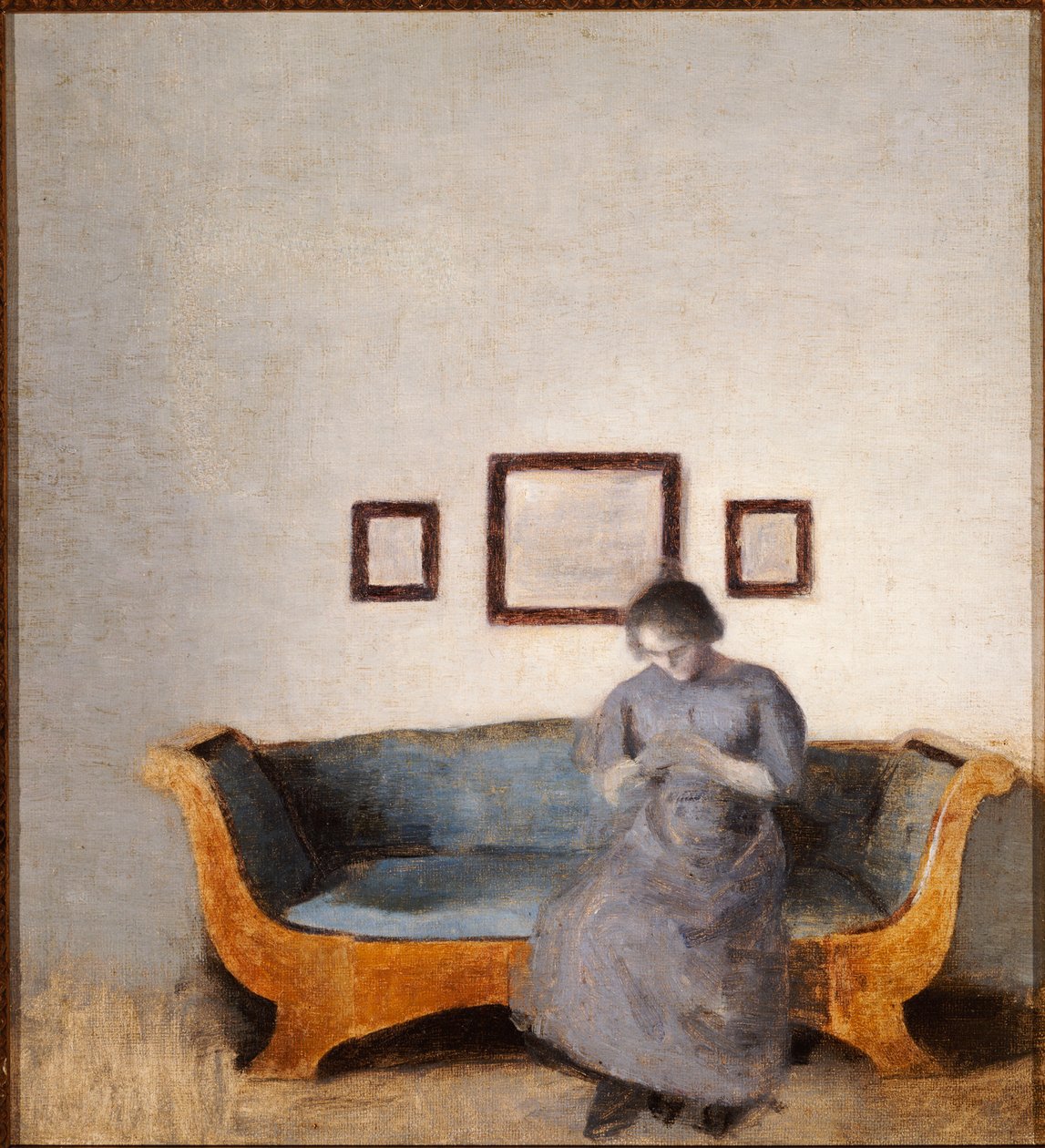 Ida Hammershøi assise sur un canapé - Vilhelm Hammershoi