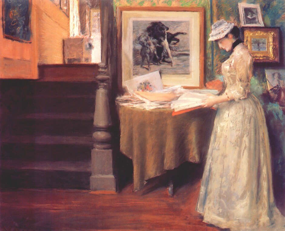 Intérieur, jeune femme à une table - William Merritt Chase