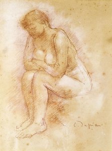 Nue assise