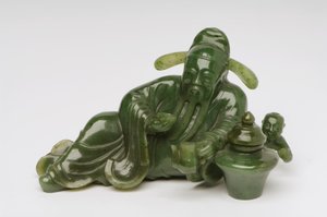 Figure de savant chinois allongé