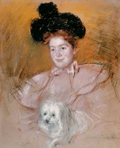 Femme tenant un chien