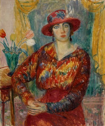 Femme en blouse rouge avec des tulipes - William James Glackens