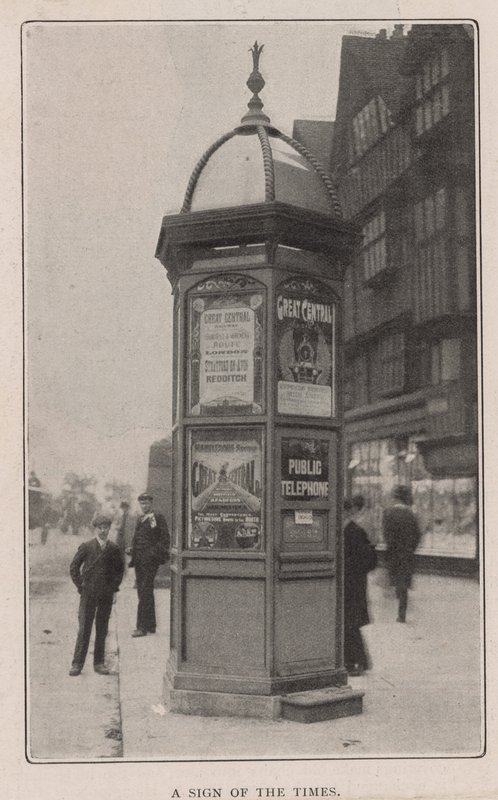Un téléphone public - English Photographer