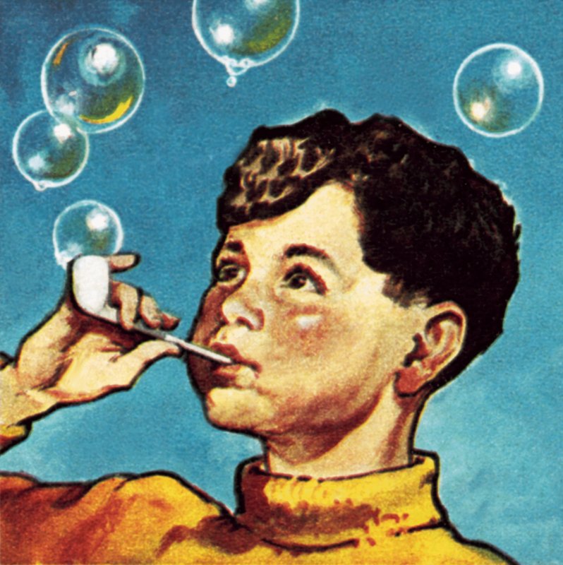 Garçon soufflant des bulles avec une pipe - English School
